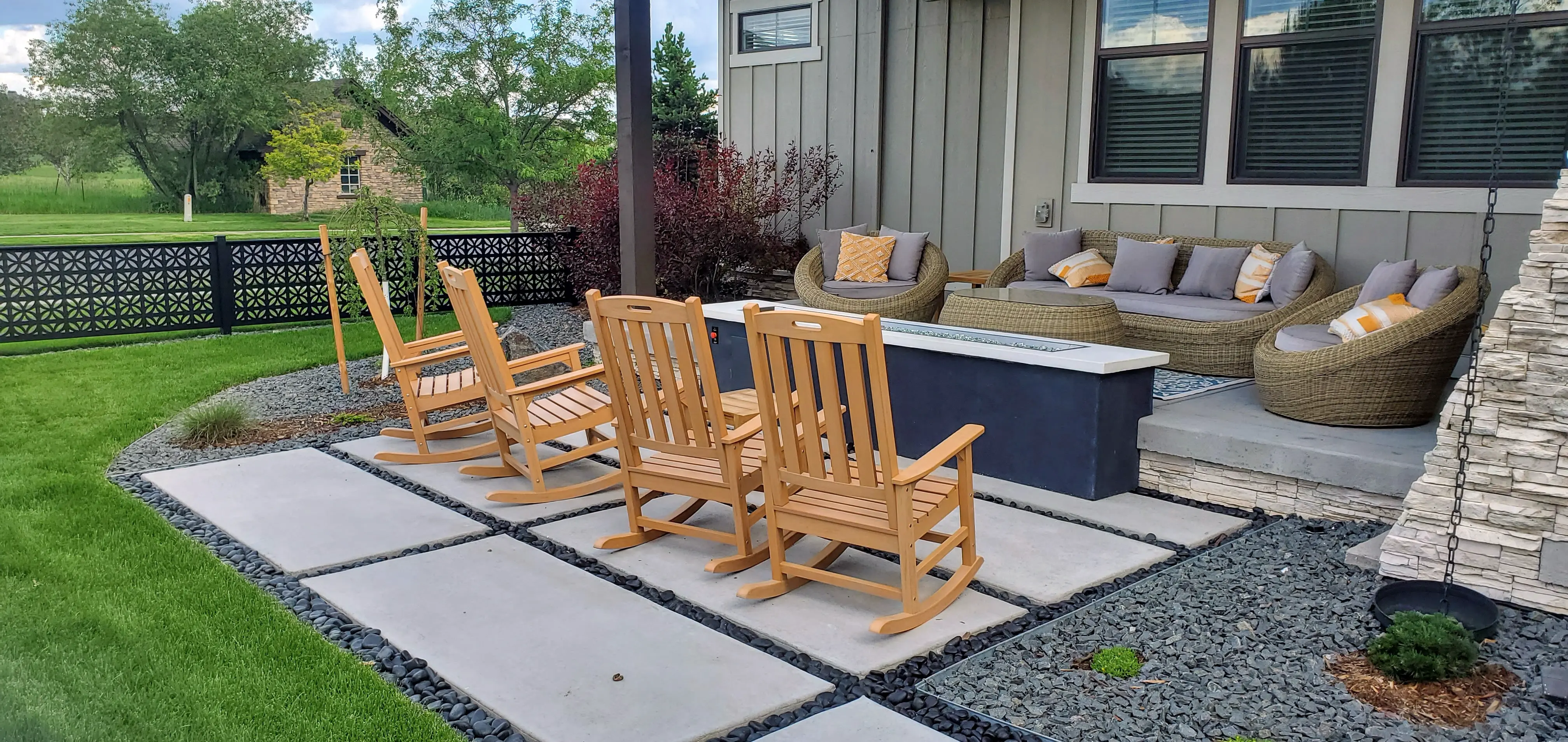 Modern paver patio with fire pit and lounge